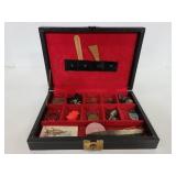 Vintage jewelry box of assorted trinkets
