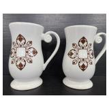 Pair of tall white ceramic mugs