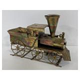 Hand sculpted metal musical train engine