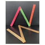 2 Vintage folding wood advertising yard sticks