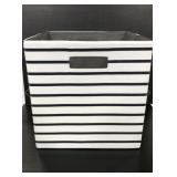 Navy blue and white striped fabric storage bin
