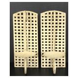 Two matching painted metal candle sconces
