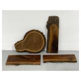 Four live edge wooden slabs