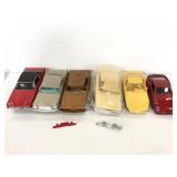 Six assorted model cars for repair