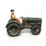 Vintage man riding tractor decoration