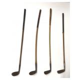 Lot of 4 vintage wooden golf clubs