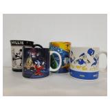 Four Disney Disney Land coffee mugs