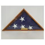 American flag in triangle case