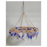 Hanging decor piece with faux pink stones