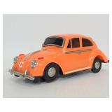 Orange Volkswagen beetle bug car model