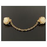 Vintage sculpted flower sweater clip