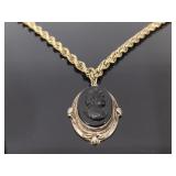 Vintage carved black cameo on gold tone chain