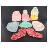 Six knitted baby hats and one pair booties