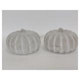 Pair of small decorative cement pumpkins