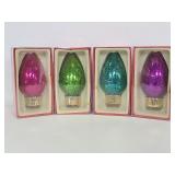 Four new unopened LED bulb ornaments