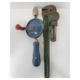 Vintage pipe wrench and hand drill combo