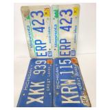 Two sets of assorted licenses plates