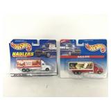 Pair of hot wheels haulers semi trucks