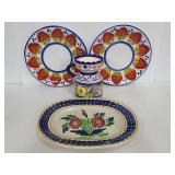 Four colorful assorted hand painted dishes