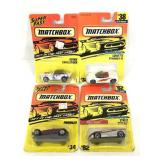 Four unopened Matchbox toy cars