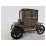 Baker Electric metal coin bank