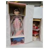 Two Design Début porcelain dolls