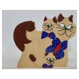 Three wood cat puzzle figure