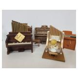 Five vintage piano and organ figurines
