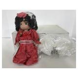 Precious Moments December doll with wings