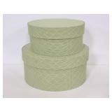 Two green diamond pattern fabric storage boxes