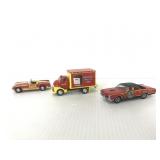 Trio of vintage Coca-cola vehicles