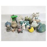 Sixteen resin and ceramic yard critters
