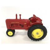 Vintage red metal Massey-Harris model tractor
