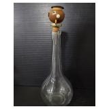 Glass bottle with wood stopper