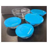 Five glass nesting bowls w/ 4 lids Frigidaire