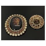 Pair of vintage amber crystal brooches