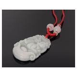 Carved jade pendant necklace