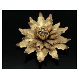 Monet gold toned sunflower brooch