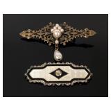 Ornate faux pearl drop and pressed brooches
