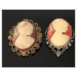 Ornate silver and gold toned cameo brooches