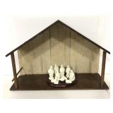 Eleven piece porcelain nativity scene & wood barn