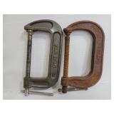 Pair of adjustable metal work clamps