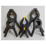 Six assorted plastic work clamps