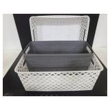 Two white & one gray storage bins