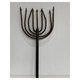 Primitive antique metal trident spear tip