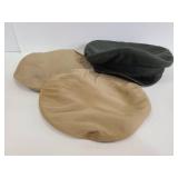 Three vintage military hats