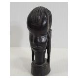 Wood carved tribal head statue