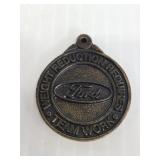 Ford weight reduction requires teamwork medal