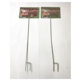 Pair of metal Santa Claus yard stake decorations