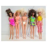 Five vintage Barbie dolls